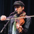 "Bright, vibrant whistling and stringed violin, Stationary looping and roundabout..."