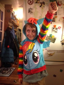 Barnaby enjoying his Rainbow Dash hoodie, the only place he feels comfortable wearing it, at home. 
