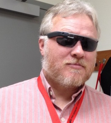 Doyle McClellan, assistant professor of the CNET program, shows off Google Glass.