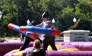 Students battle in the jousting pit near the McPike Complex, during the Lewis and Clark 2014 Fall Fest.