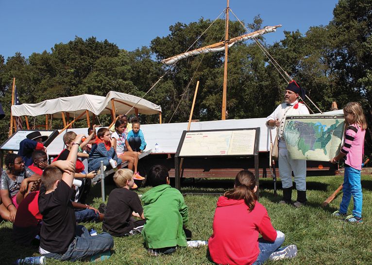 Photo by Julia Johnson - Brad Winn teaches students “The White Pirogue’s” role in Lewis and Clark’s exploration.