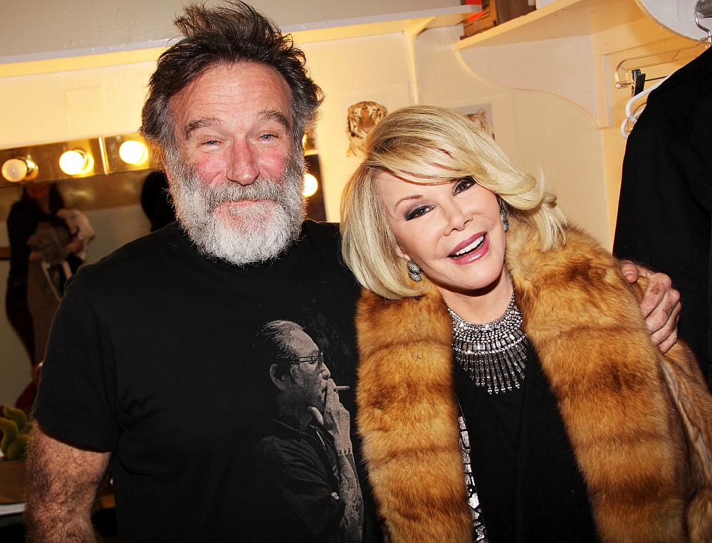 Robin Williams and Joan Rivers pose backstage at the new play "Bengal Tiger at the Baghdad Zoo" at The Richard Rogers Theater on March 29, 2011 in New York City. (Photo by Bruce Glikas/FilmMagic) from HuffingtonPost.com