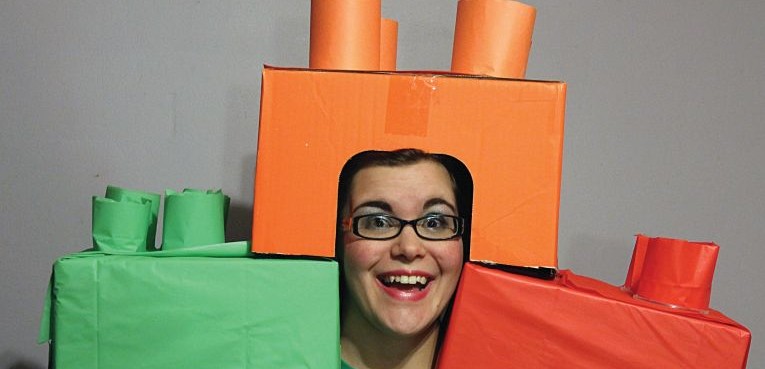 Photo by Julia Johnson - Nursing major, Kelly Rulison, sports a homemade Lego headdress costume.