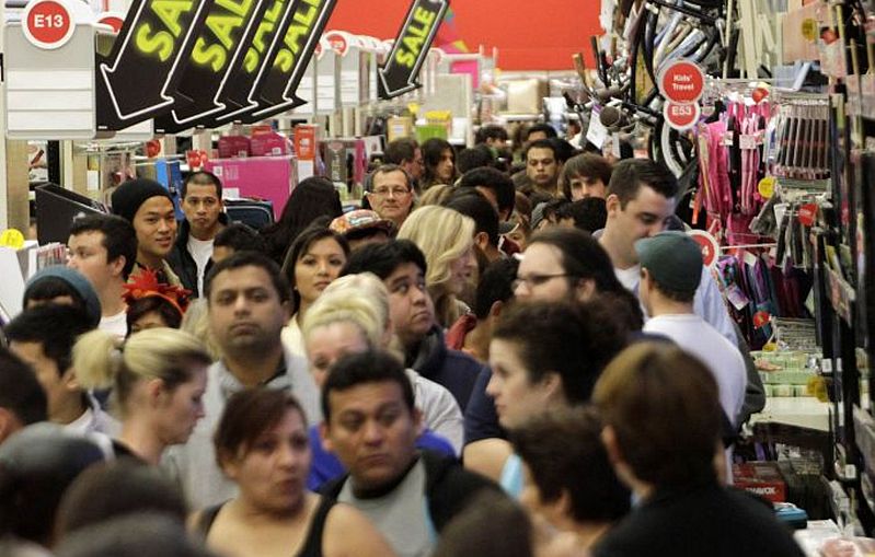 Courtesy of blog.independent.co.uk. Black Friday shoppers hunting for sales.