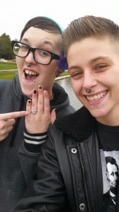 (Photo provided by Jennifer Hand)   Sarah Hodge showing off her engagement ring with her new fiance, Jennifer Hand.