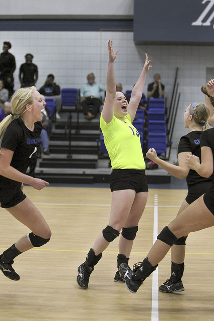 Drew Myers (13) celebrates with her team after they defeated Lincoln College in the first round of the NJCAA Region 24 match at L&C on Wednesday, Nov. 4, 2015. 