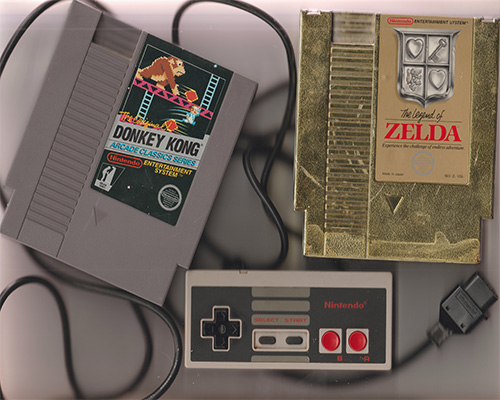 NES games Donkey Kong and Legend of Zelda with NES controller