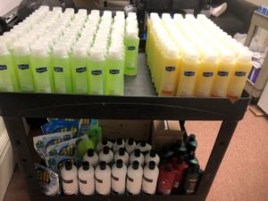 Haircare products on a cart.