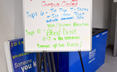 A board lets donors know free pizza is involved