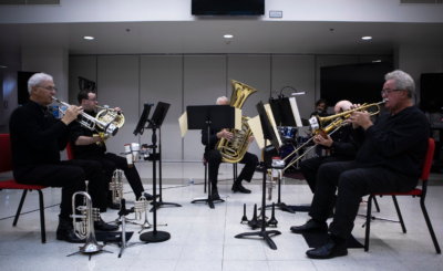 Five amazing brass players play during concert in the Ringhousen music building.