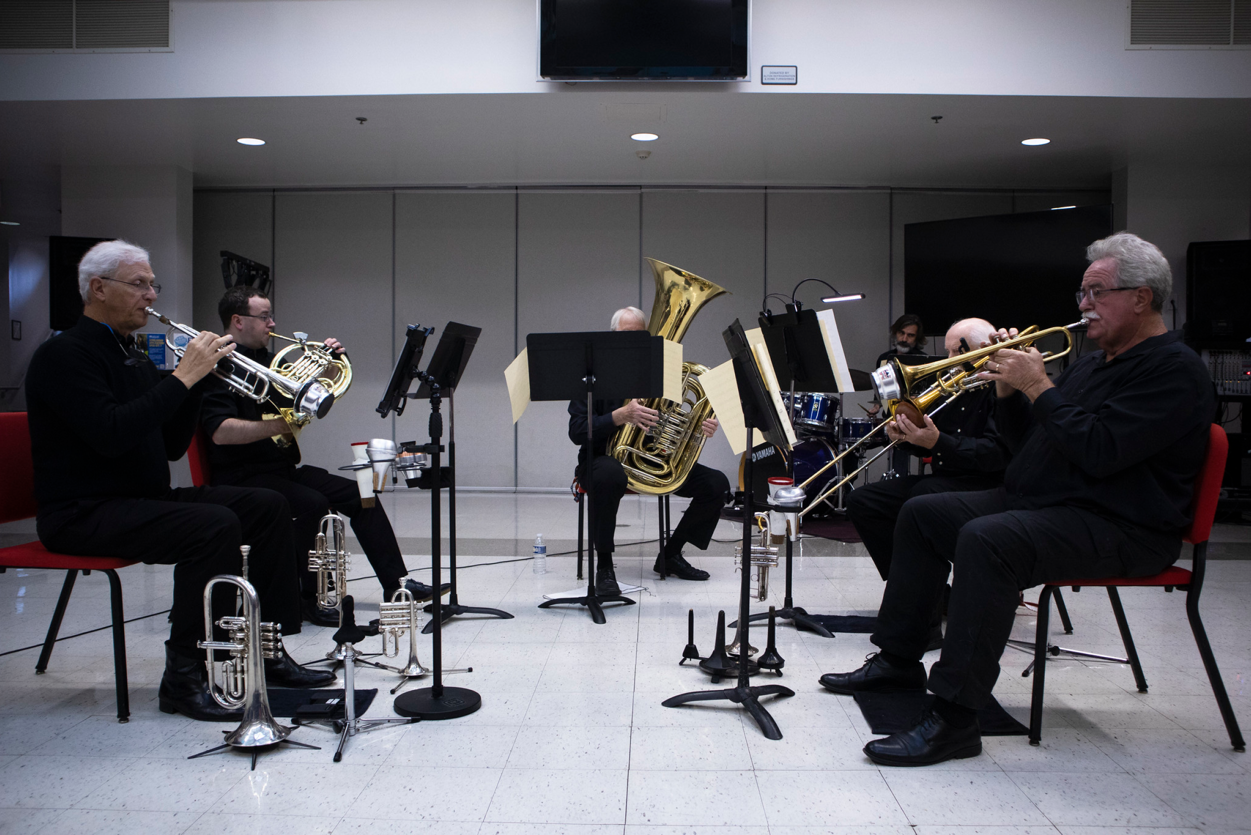 Five amazing brass players play during concert in the Ringhousen music building.