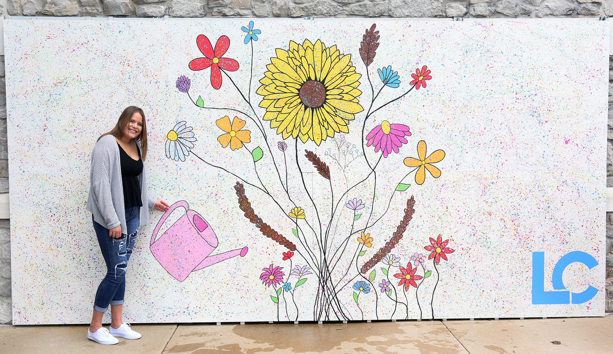 Interactive mural painted flowers