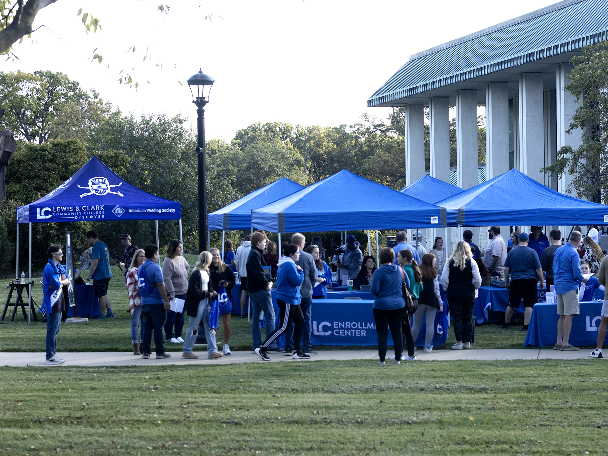potential students around information booths