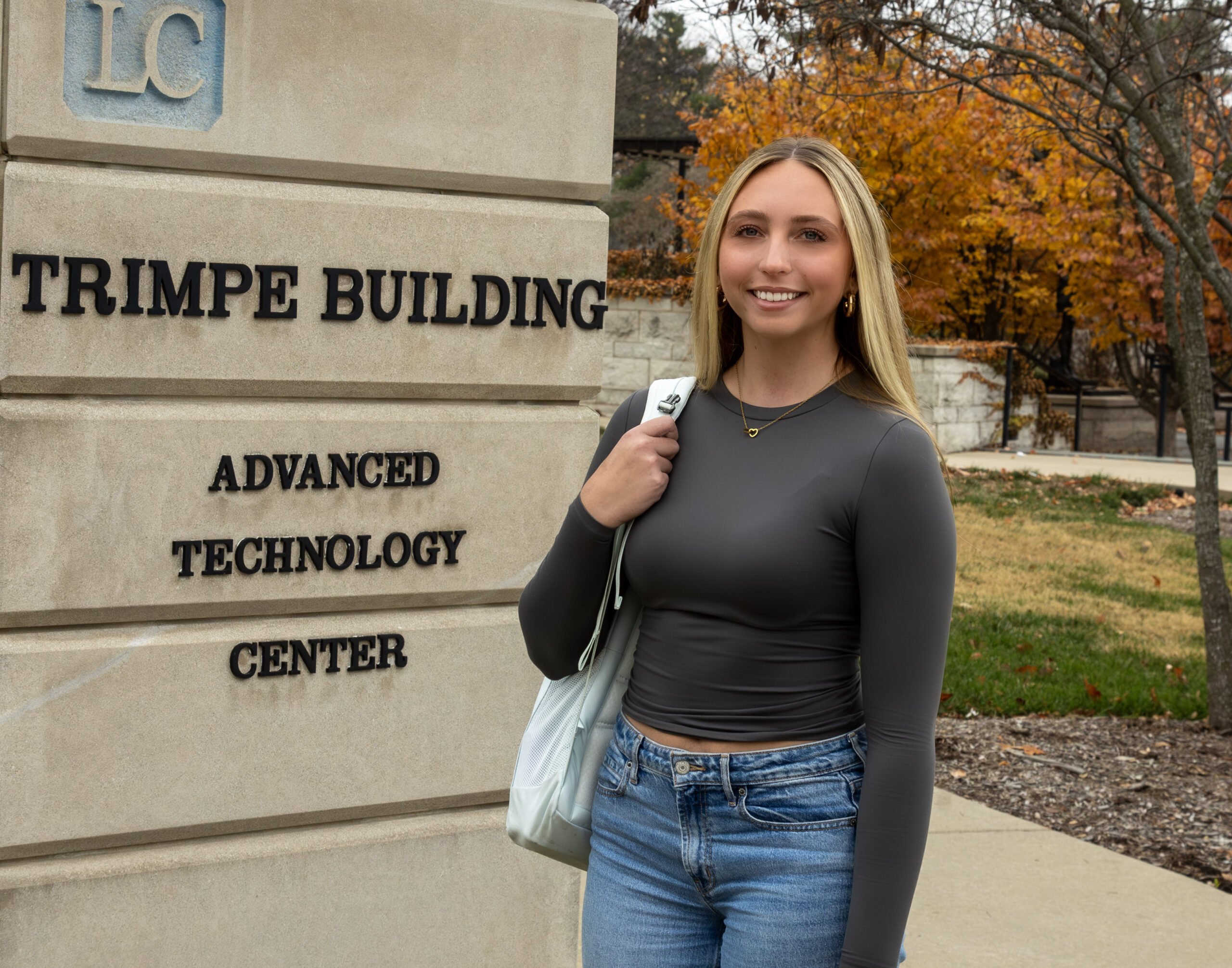 Portrait of Abigail Johnes standing in front of Lewis and Clark Trimple building.